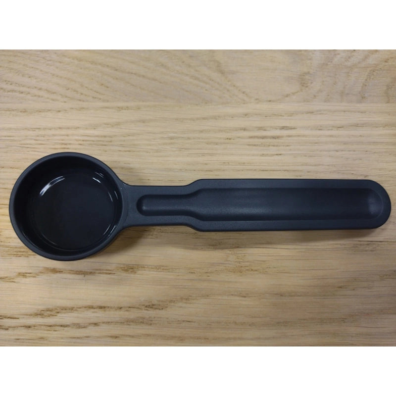 Measuring spoon for ground coffee